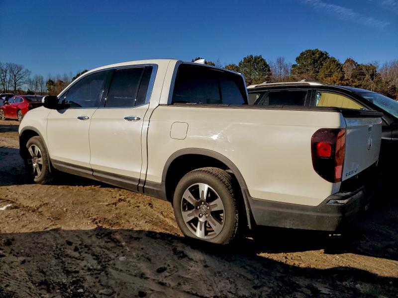 Photo 2 from auction – 2017 HONDA RIDGELINE with VIN 5FPYK3F77HB035349