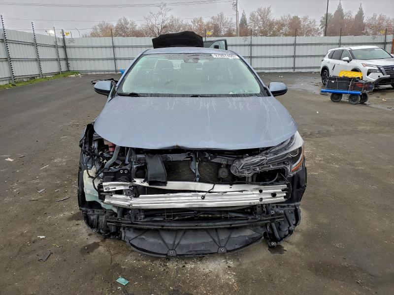 Photo 5 from auction – 2021 TOYOTA COROLLA LE with VIN JTDEAMDE6MJ024061