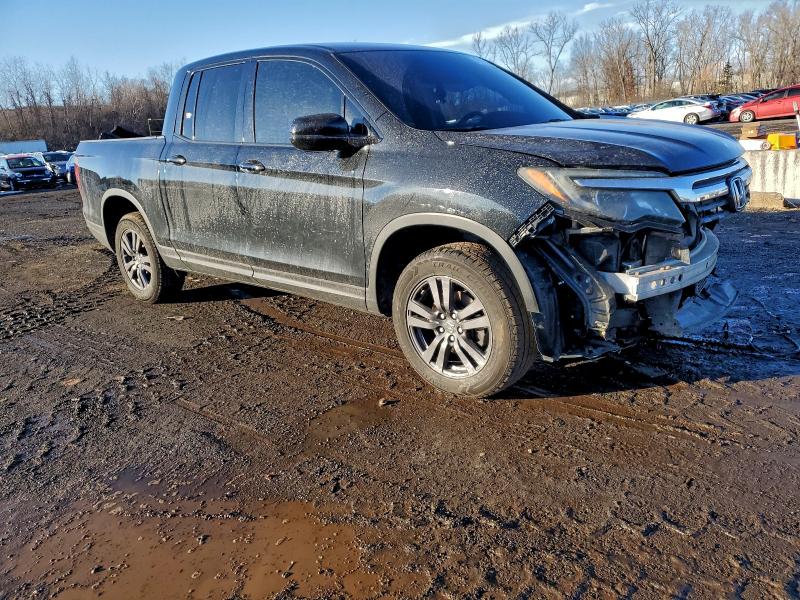 Photo 4 from auction – 2017 HONDA RIDGELINE with VIN 5FPYK3F18HB016174