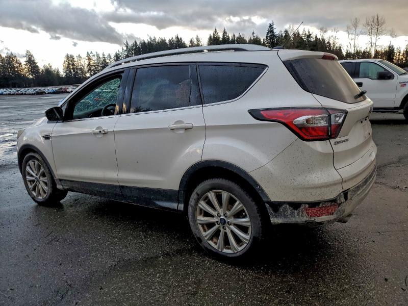Photo 2 from auction – 2017 FORD ESCAPE TIT with VIN 1FMCU0J94HUB46142