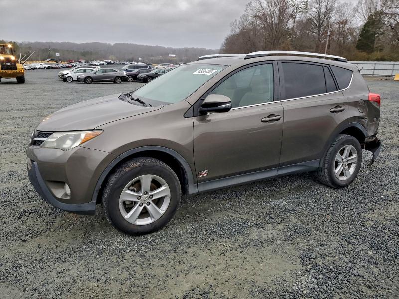 TOYOTA RAV4 XLE 2014 with VIN 2T3WFREVXEW084848 - Photo from auction