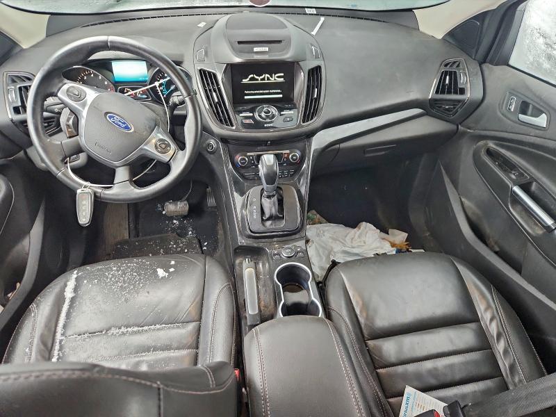 Photo 8 from auction – 2015 FORD ESCAPE with VIN 1FMCU0JX0FUC34780