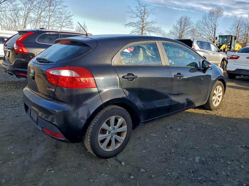 Photo 3 from auction – 2014 KIA RIO EX with VIN KNADN5A37E6376527