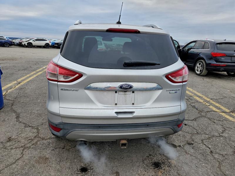 Photo 6 from auction – 2015 FORD ESCAPE TIT with VIN 1FMCU9J98FUC46245