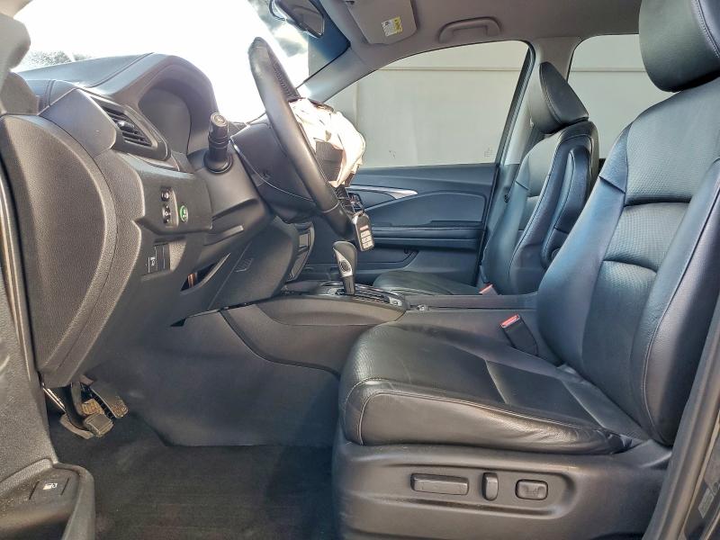 Photo 7 from auction – 2018 HONDA RIDGELINE with VIN 5FPYK2F60JB002300