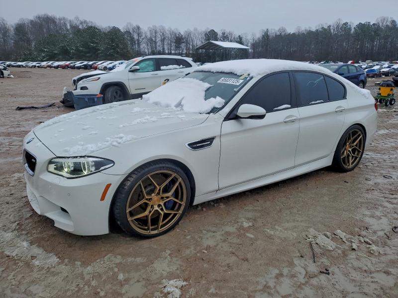 BMW M5 2014 with VIN WBSFV9C52ED097279 - Photo from auction