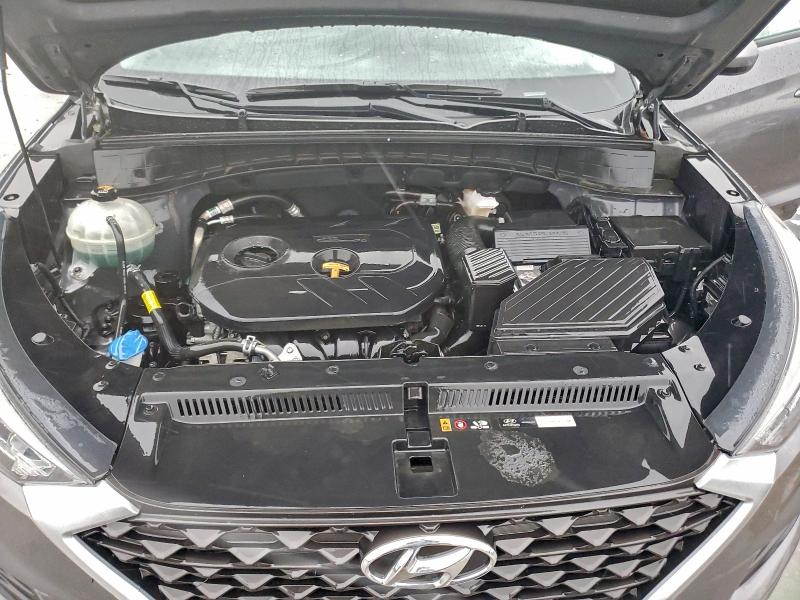 Photo 11 from auction – 2021 HYUNDAI TUCSON SE with VIN KM8J2CA48MU320050