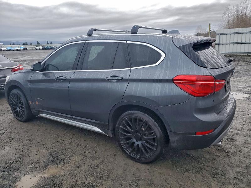 Photo 2 from auction – 2017 BMW X1 XDRIVE2 with VIN WBXHT3C37H5F74147