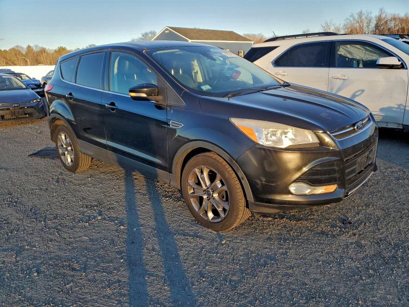 Photo 4 from auction – 2013 FORD ESCAPE with VIN 1FMCU9HX5DUD72080