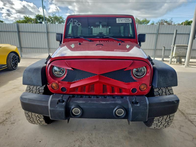 Photo 5 from auction – 2010 JEEP WRANGLER U with VIN 1J4BA6H17AL117199