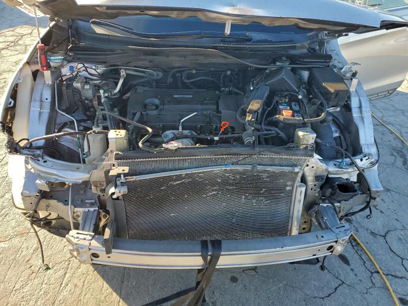 Photo 12 from auction – 2016 HONDA CR-V EX with VIN 3CZRM3H58GG707828