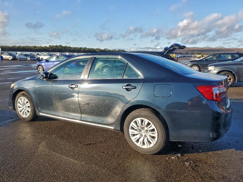Photo 2 from auction – 2014 TOYOTA CAMRY HYBR with VIN 4T1BD1FK8EU102198