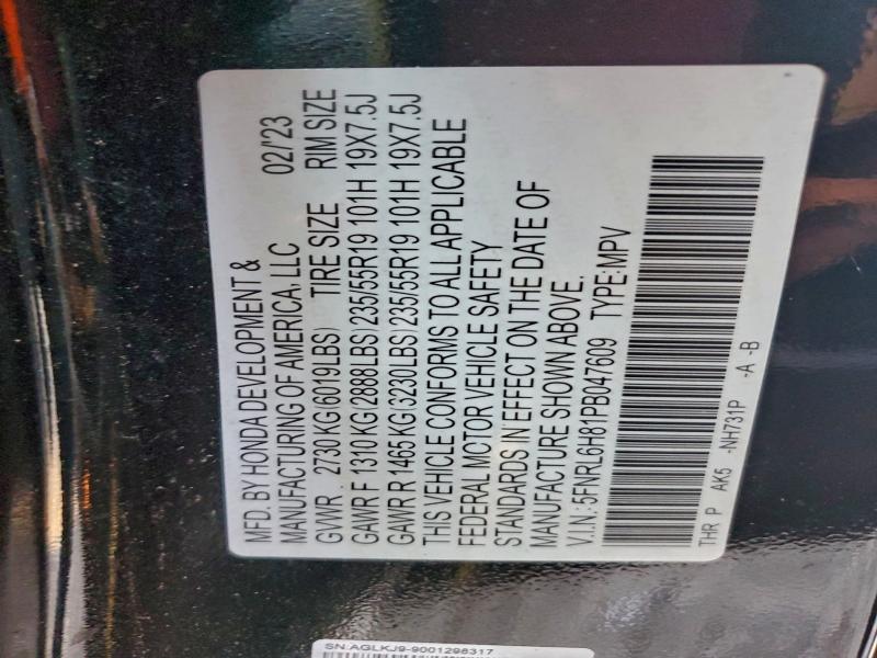 Photo 14 from auction – 2023 HONDA ODYSSEY with VIN 5FNRL6H81PB047609