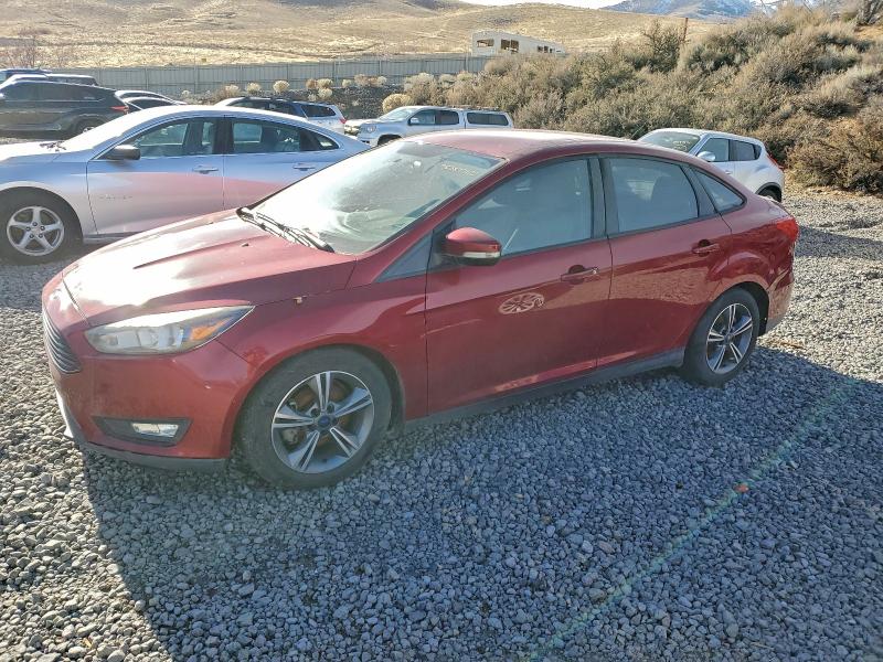 FORD FOCUS SE 2017 with VIN 1FADP3FE9HL214812 - Photo from auction