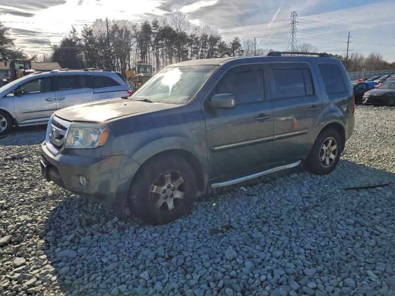 HONDA PILOT TOUR 2009 with VIN 5FNYF48819B024180 - Photo from auction