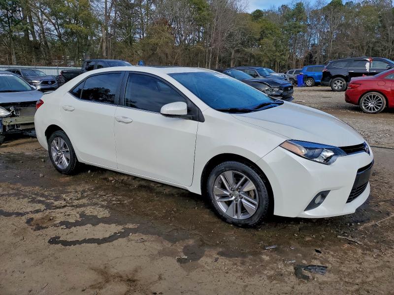 Photo 4 from auction – 2014 TOYOTA COROLLA EC with VIN 5YFBPRHE4EP036554