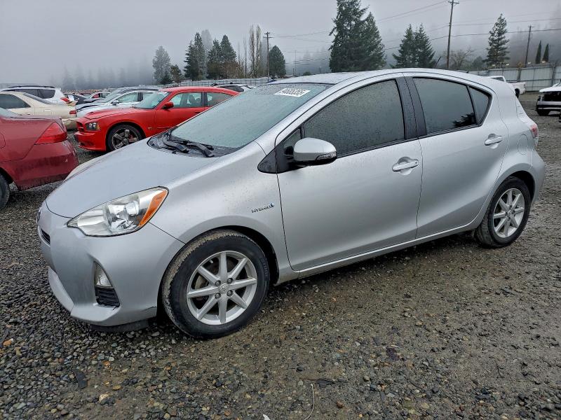 TOYOTA PRIUS C 2014 with VIN JTDKDTB37E1069355 - Photo from auction