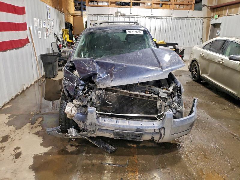 Photo 5 from auction – 2004 FORD ESCAPE LIM with VIN 1FMCU94184KA41877