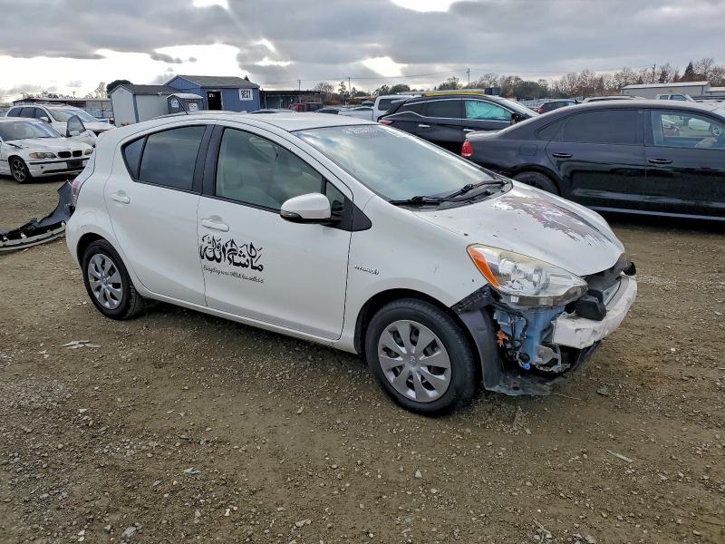 Photo 4 from auction – 2014 TOYOTA PRIUS C with VIN JTDKDTB32E1569102