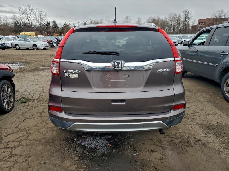 Photo 6 from auction – 2015 HONDA CR-V EXL with VIN 2HKRM4H76FH640004