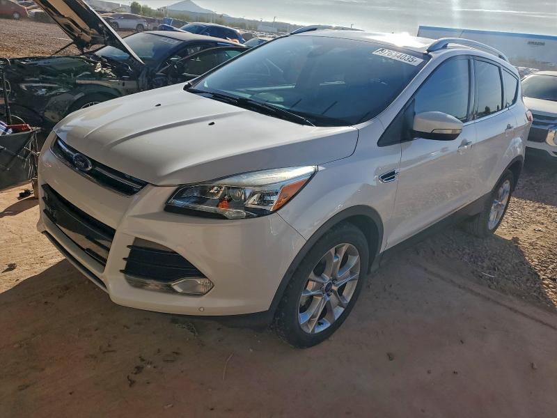 FORD ESCAPE TIT 2014 with VIN 1FMCU0J90EUE41072 - Photo from auction