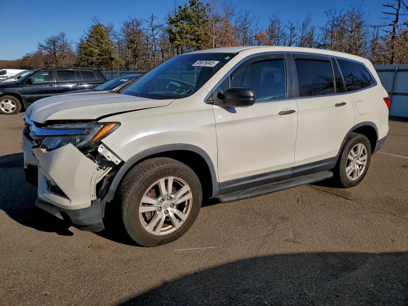 HONDA PILOT LX 2016 with VIN 5FNYF6H16GB058451 - Photo from auction