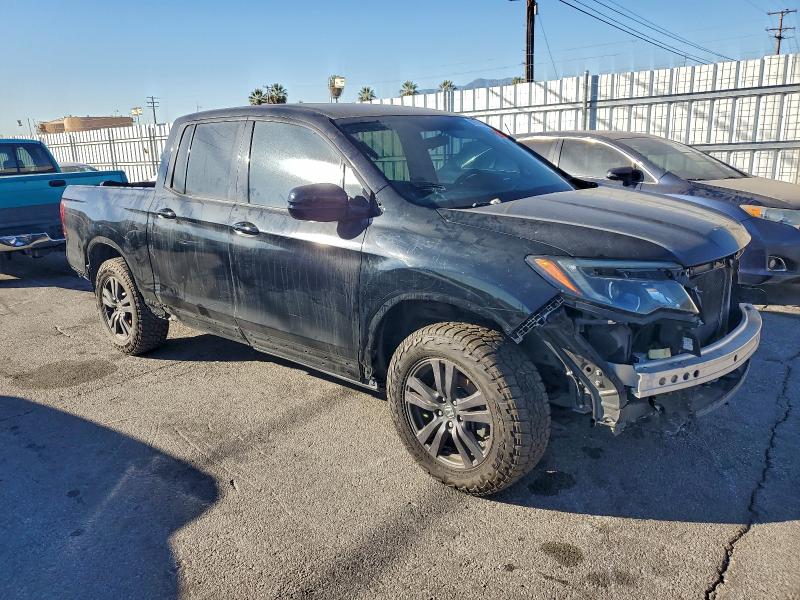 Photo 4 from auction – 2018 HONDA RIDGELINE with VIN 5FPYK3F16JB000142