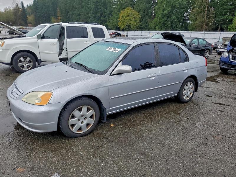 HONDA CIVIC EX 2002 with VIN 2HGES26712H594226 - Photo from auction