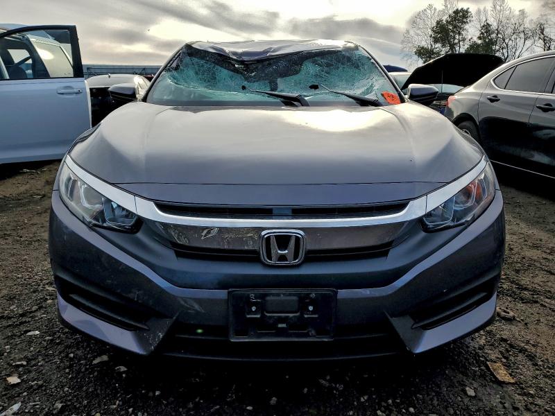 Photo 5 from auction – 2016 HONDA CIVIC LX with VIN 2HGFC2F51GH555448