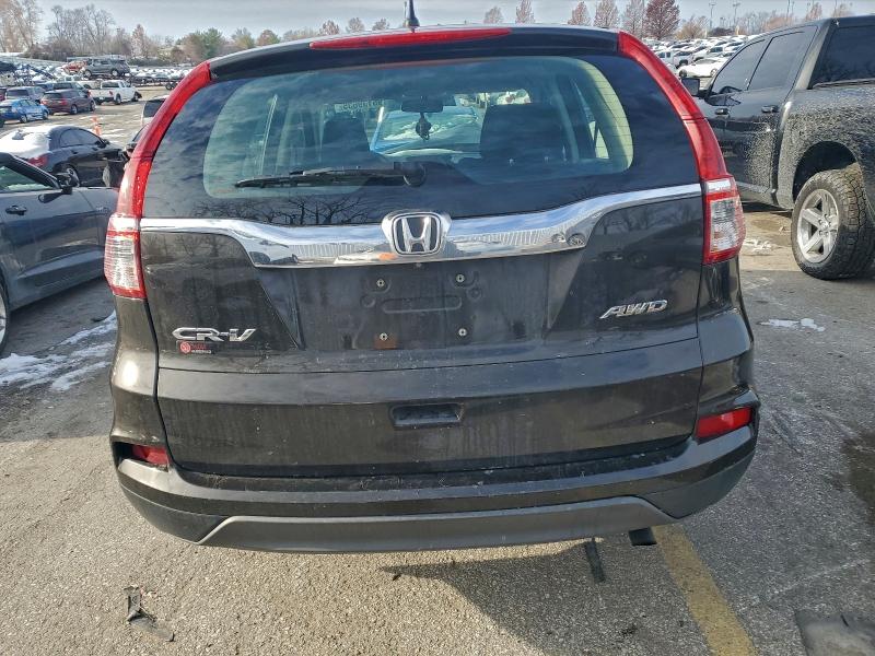 Photo 6 from auction – 2015 HONDA CR-V LX with VIN 5J6RM4H36FL073375