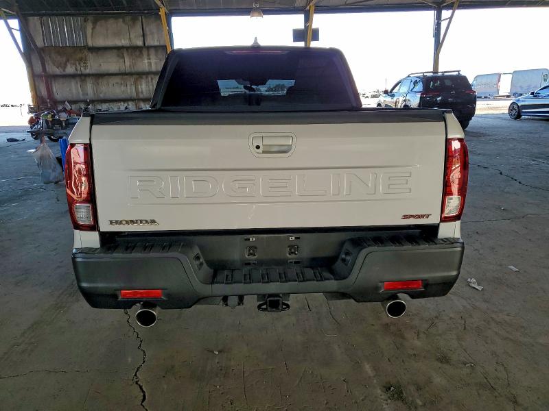 Photo 6 from auction – 2024 HONDA RIDGELINE with VIN 5FPYK3F13RB025348