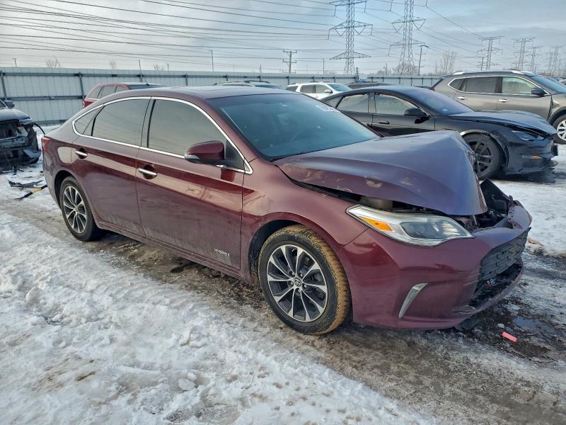 Photo 4 from auction – 2016 TOYOTA AVALON HYB with VIN 4T1BD1EB2GU048739