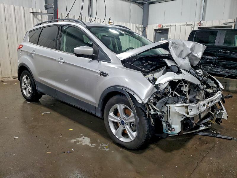 Photo 4 from auction – 2016 FORD ESCAPE SE with VIN 1FMCU9GX4GUB92398