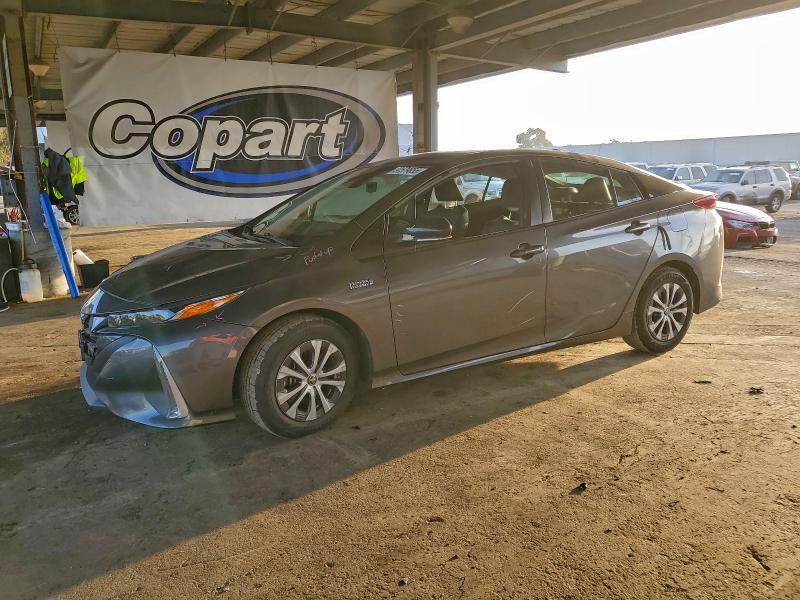TOYOTA PRIUS PRIM 2021 with VIN JTDKAMFP2M3196089 - Photo from auction