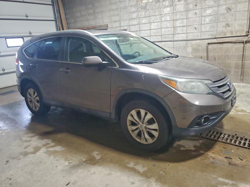 Photo 4 from auction – 2014 HONDA CR-V EXL with VIN 2HKRM3H72EH559901
