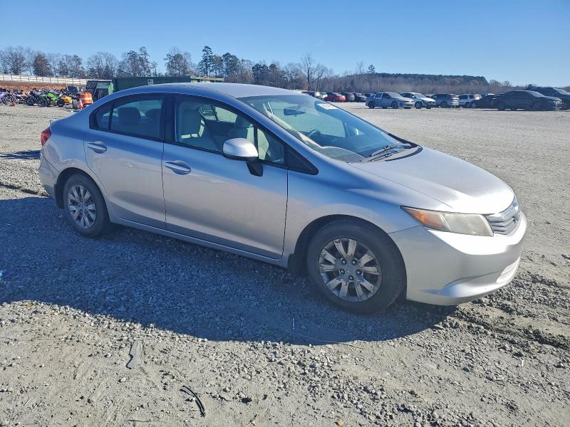 Photo 4 from auction – 2012 HONDA CIVIC LX with VIN 19XFB2F50CE110416