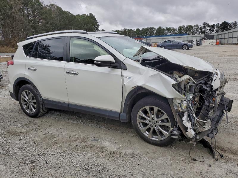 Photo 4 from auction – 2016 TOYOTA RAV4 HV LI with VIN JTMDJREV2GD013679