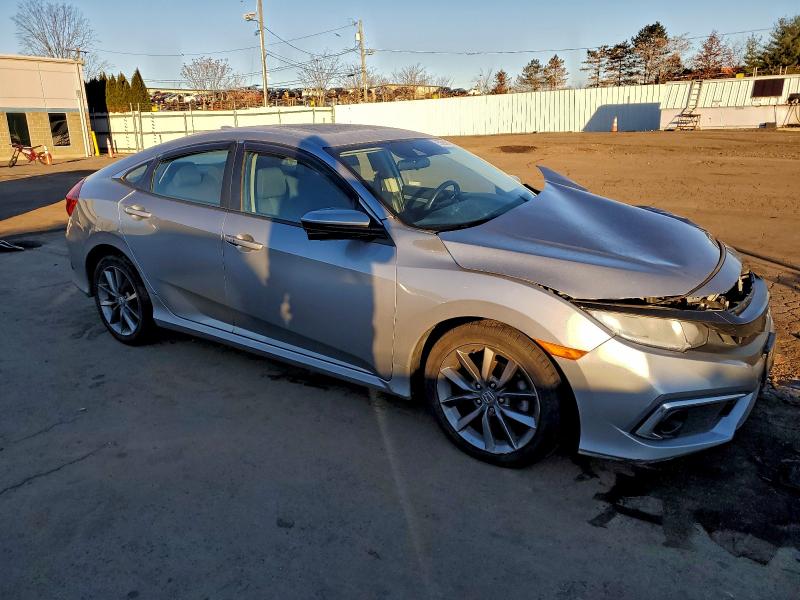 Photo 4 from auction – 2019 HONDA CIVIC EX with VIN 19XFC1F36KE205129