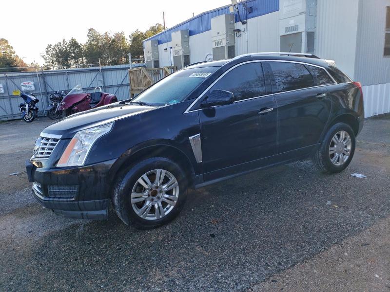 CADILLAC SRX LUXURY 2014 with VIN 3GYFNBE32ES545539 - Photo from auction