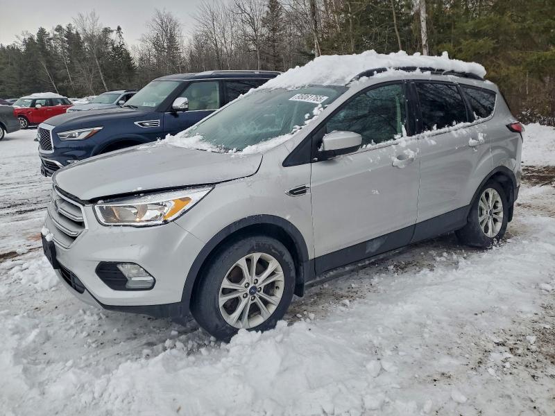FORD ESCAPE SE 2018 with VIN 1FMCU9GD4JUD32608 - Photo from auction