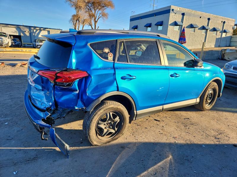 Photo 3 from auction – 2018 TOYOTA RAV4 LE with VIN 2T3BFREV2JW836471