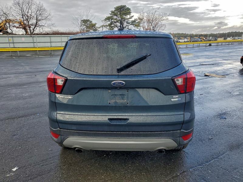 Photo 6 from auction – 2019 FORD ESCAPE with VIN 1FMCU9GD8KUA37612