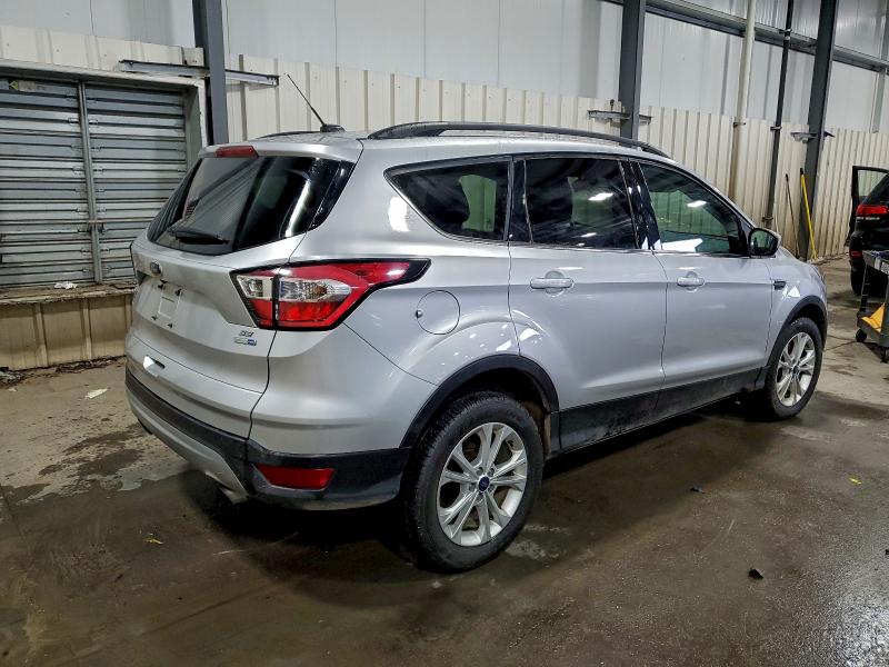 Photo 3 from auction – 2017 FORD ESCAPE SE with VIN 1FMCU9GD5HUC01875