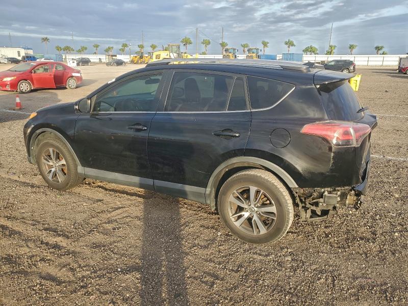 Photo 2 from auction – 2017 TOYOTA RAV4 XLE with VIN 2T3WFREV9HW345102