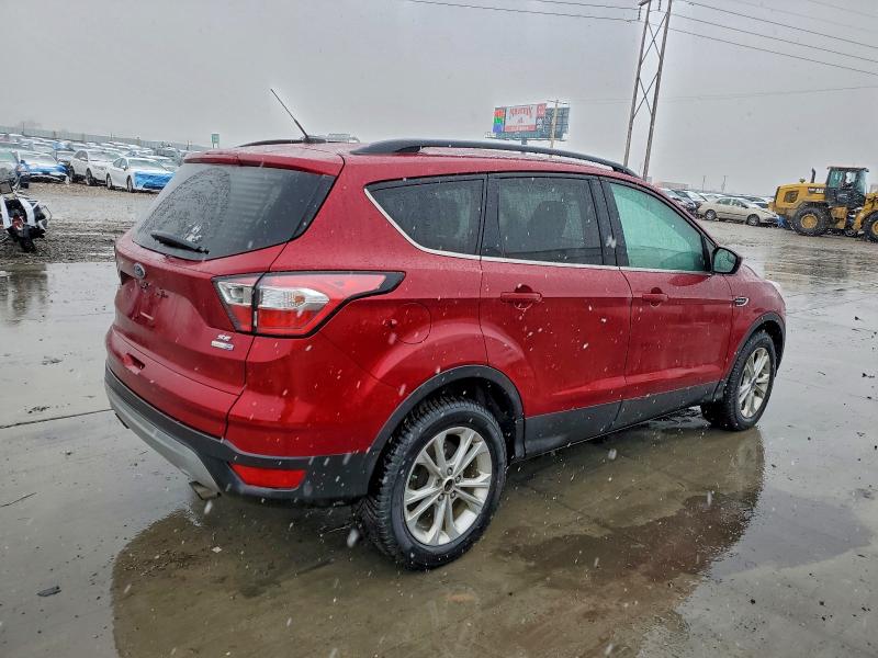 Photo 3 from auction – 2018 FORD ESCAPE SE with VIN 1FMCU9G99JUC50112