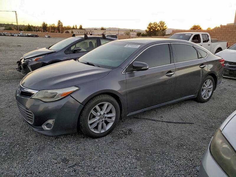 TOYOTA AVALON BAS 2014 with VIN 4T1BK1EBXEU087937 - Photo from auction