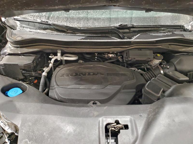 Photo 12 from auction – 2021 HONDA PASSPORT E with VIN 5FNYF8H09MB026690