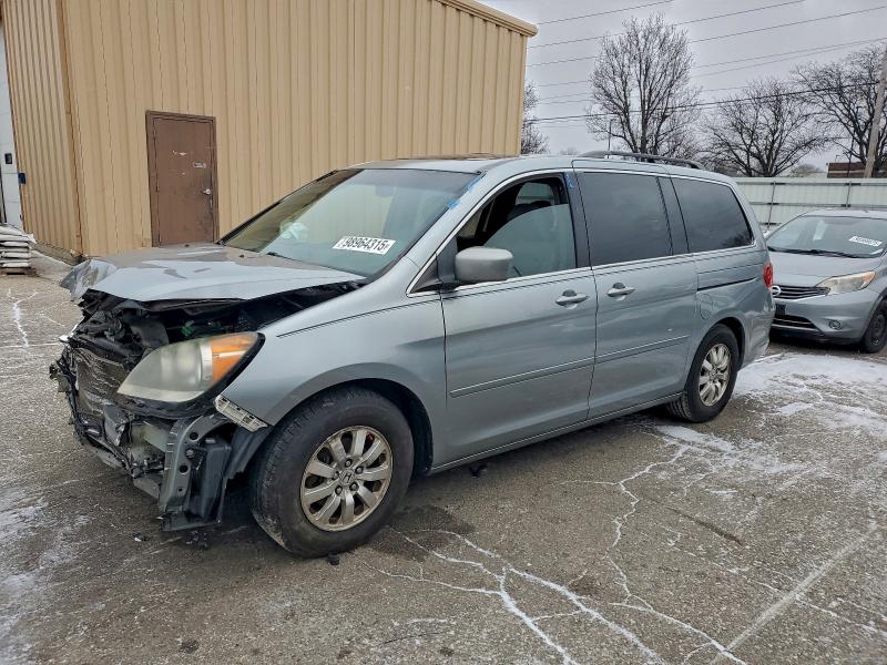 HONDA ODYSSEY EX 2010 with VIN 5FNRL3H60AB039635 - Photo from auction