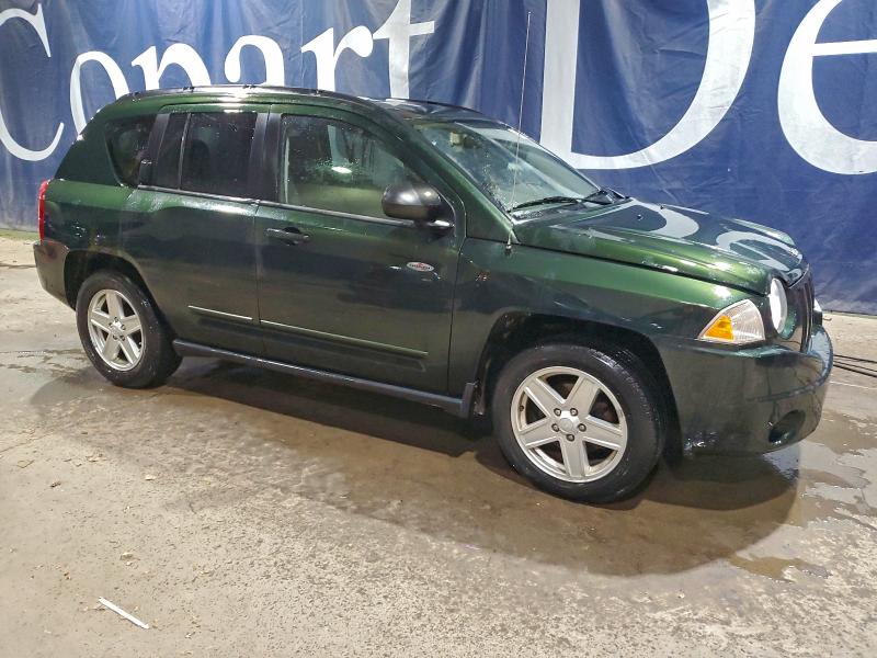 Photo 4 from auction – 2010 JEEP COMPASS with VIN 1J4NT4FBXAD622798