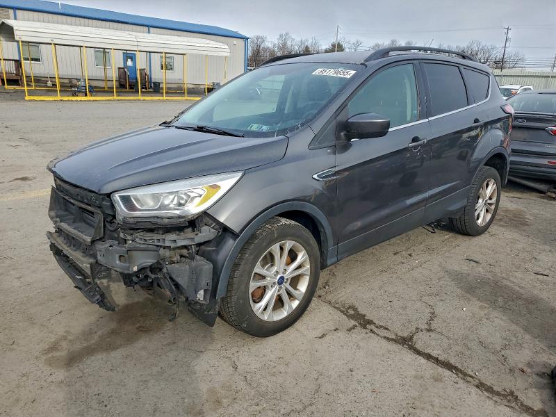 Photo 1 from auction – 2017 FORD ESCAPE with VIN 1FMCU9GD6HUC83342